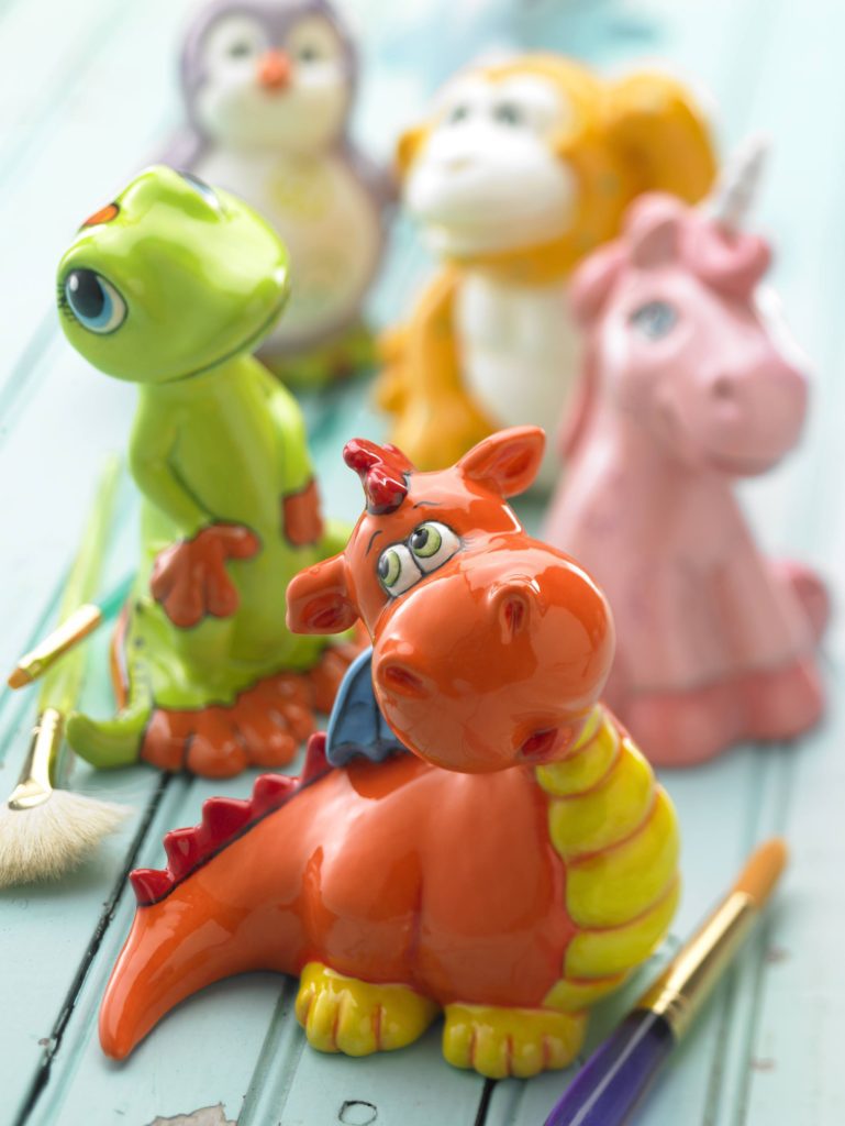 Picture of ceramic animals: dragon, frog & unicorn